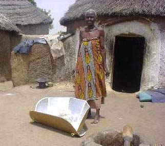 Solar-Panel-Cooker-in-front-of-hut